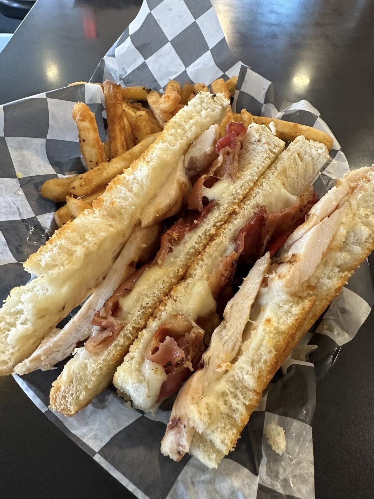 Grilled chicken and bacon melt with fries