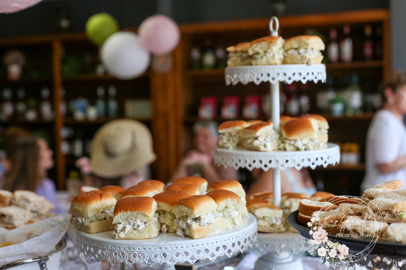 Chicken salad sliders and tea sandwiches on tiered stands