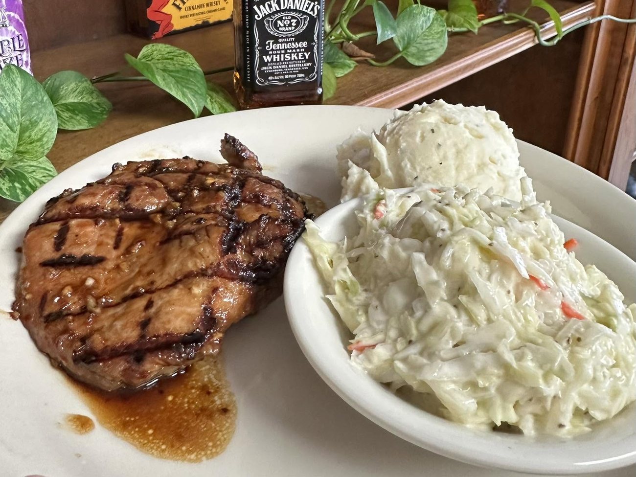 Grilled glazed chicken with mashed potatoes and coleslaw