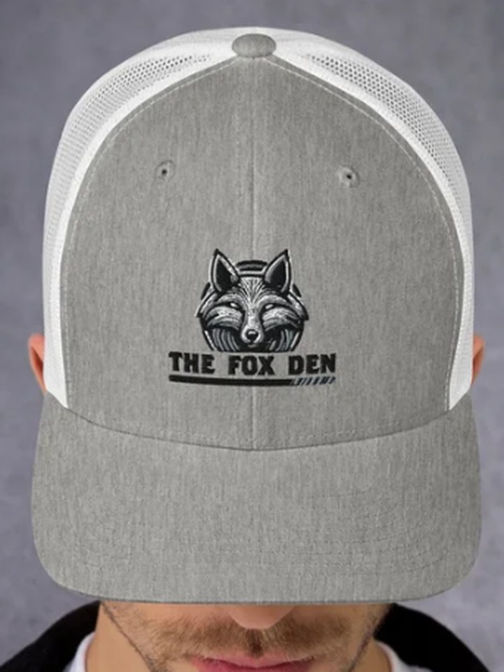 Grey and white trucker cap with the embroidered Fox Den logo