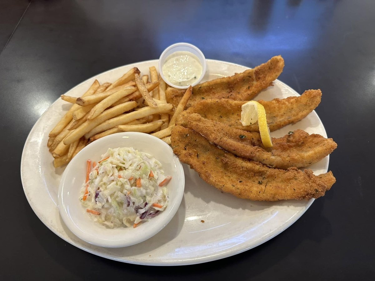 Fried Lake Erie perch dinner with fries and coleslaw
