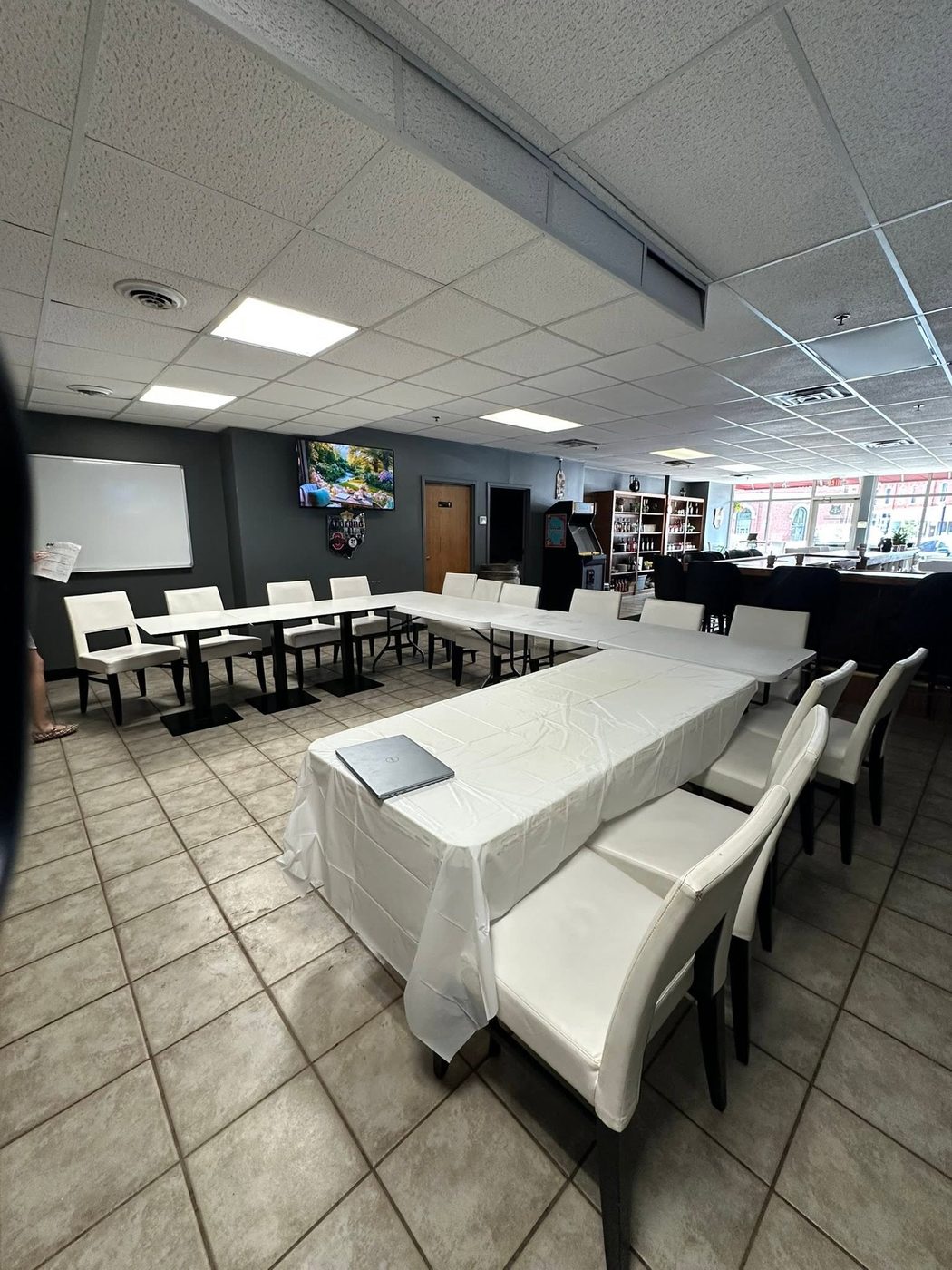 Party Center room set with tables and linens