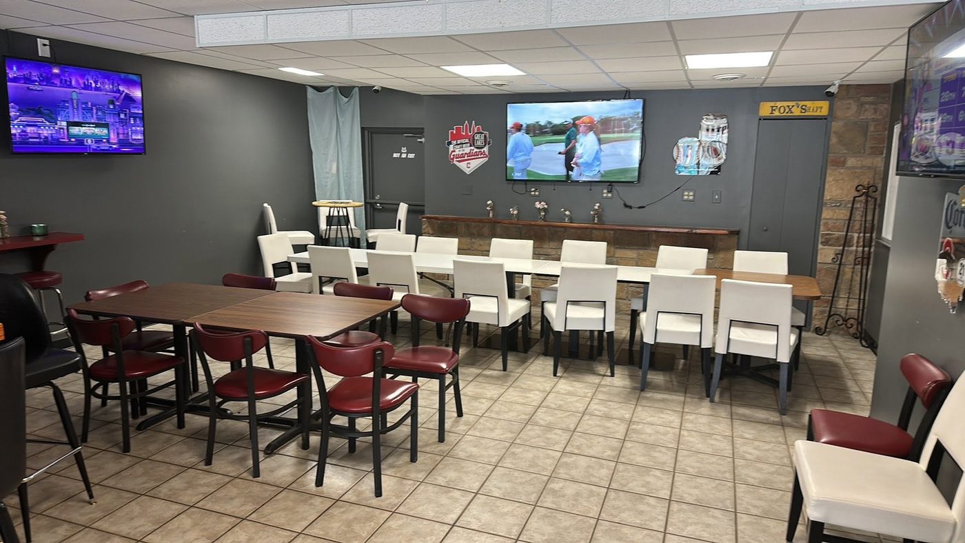 Party room with bar and TVs