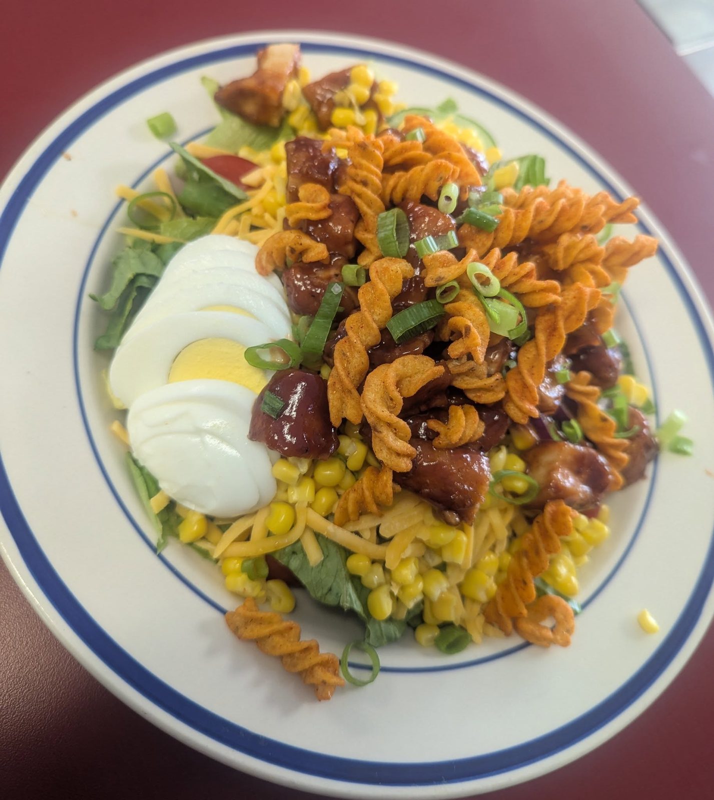 BBQ chicken salad with rotini, corn and egg
